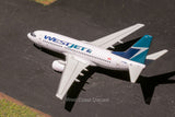 Dragon Wings WestJet Boeing 737-700 C-FIWS